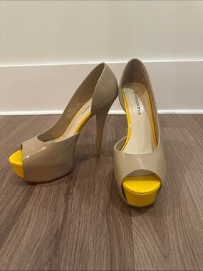 Passport Taupe Peep-Toe Pumps with Yellow Platform